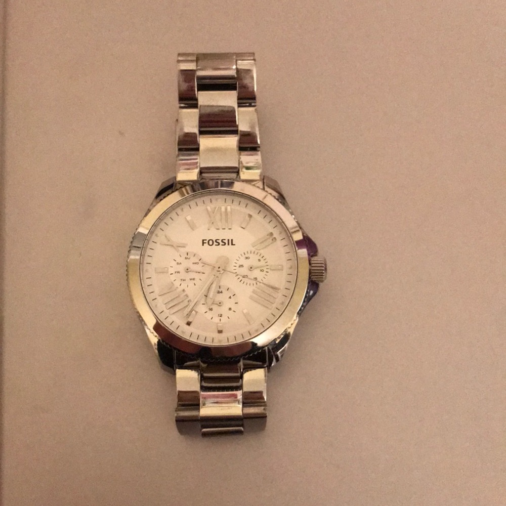 Silver fossil watch